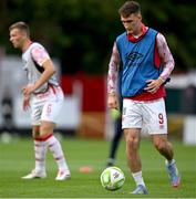 13 June 2025; Mason Melia of St Patrick's Athletic warms up before the SSE Airtricity Men's Premier Division match between St Patrick's Athletic and Drogheda United at Richmond Park in Dublin. Photo by Shauna Clinton/Sportsfile