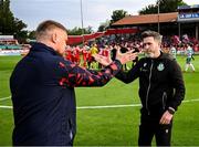 13 June 2025; Shamrock Rovers manager Stephen Bradley, right, and Shelbourne manager Damien Duff shake hands before the SSE Airtricity Men's Premier Division match between Shelbourne and Shamrock Rovers at Tolka Park in Dublin. Photo by Stephen McCarthy/Sportsfile