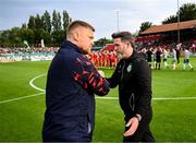 13 June 2025; Shamrock Rovers manager Stephen Bradley, right, and Shelbourne manager Damien Duff shake hands before the SSE Airtricity Men's Premier Division match between Shelbourne and Shamrock Rovers at Tolka Park in Dublin. Photo by Stephen McCarthy/Sportsfile