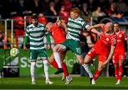 13 June 2025; Rory Gaffney of Shamrock Rovers in action against Mark Coyle, left, and Kerr McInroy of Shelbourne during the SSE Airtricity Men's Premier Division match between Shelbourne and Shamrock Rovers at Tolka Park in Dublin. Photo by Sam Barnes/Sportsfile