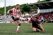 13 June 2025; Ronan Boyce of Derry City in action against Greg Cunningham of Galway United during the SSE Airtricity Men's Premier Division match between Derry City and Galway United at The Ryan McBride Brandywell Stadium in Derry. Photo by Ramsey Cardy/Sportsfile