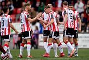 13 June 2025; Derry City players celebrate their side's first goal, scored by Kevin Holt, 22, during the SSE Airtricity Men's Premier Division match between Derry City and Galway United at The Ryan McBride Brandywell Stadium in Derry. Photo by Ramsey Cardy/Sportsfile