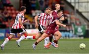 13 June 2025; Edward McCarthy of Galway United in action against Adam O'Reilly, left, and Ronan Boyce of Derry City during the SSE Airtricity Men's Premier Division match between Derry City and Galway United at The Ryan McBride Brandywell Stadium in Derry. Photo by Ramsey Cardy/Sportsfile