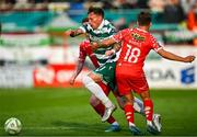 13 June 2025;Danny Grant of Shamrock Rovers in action against James Norris of Shelbourne during the SSE Airtricity Men's Premier Division match between Shelbourne and Shamrock Rovers at Tolka Park in Dublin. Photo by Sam Barnes/Sportsfile