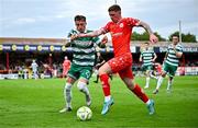13 June 2025; Kameron Ledwidge of Shelbourne in action against Danny Grant of Shamrock Rovers during the SSE Airtricity Men's Premier Division match between Shelbourne and Shamrock Rovers at Tolka Park in Dublin. Photo by Sam Barnes/Sportsfile