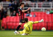 13 June 2025; Archie Meekison of Bohemians on his way to scoring his side's first goal despite the attention of Cork City goalkeeper Tein Troost during the SSE Airtricity Men's Premier Division match between Cork City and Bohemians at Turner's Cross in Cork. Photo by Michael P Ryan/Sportsfile