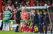 13 June 2025; Shelbourne manager Damien Duff is shown a yellow card by referee Rob Harvey during the SSE Airtricity Men's Premier Division match between Shelbourne and Shamrock Rovers at Tolka Park in Dublin. Photo by Stephen McCarthy/Sportsfile
