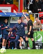13 June 2025; Shelbourne manager Damien Duff is shown a yellow card by referee Rob Harvey during the SSE Airtricity Men's Premier Division match between Shelbourne and Shamrock Rovers at Tolka Park in Dublin. Photo by Sam Barnes/Sportsfile