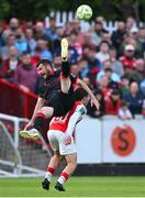 13 June 2025; Kian Leavy of St Patrick's Athletic in action against Ryan Brennan of Drogheda United during the SSE Airtricity Men's Premier Division match between St Patrick's Athletic and Drogheda United at Richmond Park in Dublin. Photo by Shauna Clinton/Sportsfile