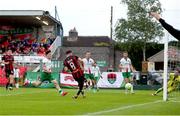 13 June 2025; Dayle Rooney of Bohemians shoots to score his side's second goal during the SSE Airtricity Men's Premier Division match between Cork City and Bohemians at Turner's Cross in Cork. Photo by Michael P Ryan/Sportsfile