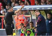 13 June 2025; Shelbourne manager Damien Duff is shown a yellow card by referee Rob Harvey during the SSE Airtricity Men's Premier Division match between Shelbourne and Shamrock Rovers at Tolka Park in Dublin. Photo by Stephen McCarthy/Sportsfile