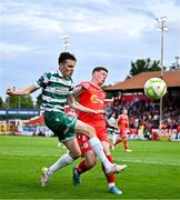 13 June 2025; Matt Healy of Shamrock Rovers in action against Kameron Ledwidge of Shelbourne during the SSE Airtricity Men's Premier Division match between Shelbourne and Shamrock Rovers at Tolka Park in Dublin. Photo by Sam Barnes/Sportsfile