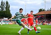 13 June 2025; Matt Healy of Shamrock Rovers in action against Kameron Ledwidge of Shelbourne during the SSE Airtricity Men's Premier Division match between Shelbourne and Shamrock Rovers at Tolka Park in Dublin. Photo by Sam Barnes/Sportsfile