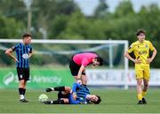 13 June 2025; Referee Ryan Maher tends to the injured Oisin Duffy during the SSE Airtricity Men's First Division match between Athlone Town and Kerry at Athlone Town Stadium in Westmeath. Photo by Thomas Flinkow/Sportsfile