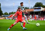 13 June 2025; Kameron Ledwidge of Shelbourne in action against Danny Grant of Shamrock Rovers during the SSE Airtricity Men's Premier Division match between Shelbourne and Shamrock Rovers at Tolka Park in Dublin. Photo by Sam Barnes/Sportsfile