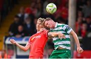 13 June 2025; Sean Boyd of Shelbourne in action against Daniel Cleary of Shamrock Rovers during the SSE Airtricity Men's Premier Division match between Shelbourne and Shamrock Rovers at Tolka Park in Dublin. Photo by Stephen McCarthy/Sportsfile
