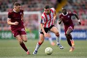 13 June 2025; Michael Duffy of Derry City in action against Garry Buckley of Galway United during the SSE Airtricity Men's Premier Division match between Derry City and Galway United at The Ryan McBride Brandywell Stadium in Derry. Photo by Ramsey Cardy/Sportsfile