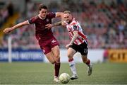 13 June 2025; Carl Winchester of Derry City in action against Patrick Hickey of Galway United during the SSE Airtricity Men's Premier Division match between Derry City and Galway United at The Ryan McBride Brandywell Stadium in Derry. Photo by Ramsey Cardy/Sportsfile