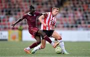 13 June 2025; Jeannot Esua of Galway United in action against Sam Todd of Derry City during the SSE Airtricity Men's Premier Division match between Derry City and Galway United at The Ryan McBride Brandywell Stadium in Derry. Photo by Ramsey Cardy/Sportsfile
