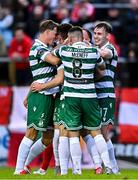 13 June 2025; Josh Honohan of Shamrock Rovers, hidden, celebrates with teammates after scoring his side's second goal during the SSE Airtricity Men's Premier Division match between Shelbourne and Shamrock Rovers at Tolka Park in Dublin. Photo by Sam Barnes/Sportsfile