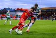 13 June 2025; Ali Coote of Shelbourne is tackled by Lee Grace of Shamrock Rovers during the SSE Airtricity Men's Premier Division match between Shelbourne and Shamrock Rovers at Tolka Park in Dublin. Photo by Stephen McCarthy/Sportsfile
