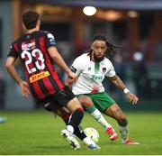 13 June 2025; Milan Mbeng of Cork City in action against Bohemians players, from left, Archie Meekison and Dawson Devoy during the SSE Airtricity Men's Premier Division match between Cork City and Bohemians at Turner's Cross in Cork. Photo by Michael P Ryan/Sportsfile