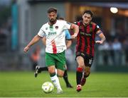 13 June 2025; Greg Bolger of Cork City in action against Dawson Devoy of Bohemians during the SSE Airtricity Men's Premier Division match between Cork City and Bohemians at Turner's Cross in Cork. Photo by Michael P Ryan/Sportsfile