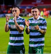 13 June 2025; Danny Grant, right, and Aaron McEneff of Shamrock Rovers celebrate after the SSE Airtricity Men's Premier Division match between Shelbourne and Shamrock Rovers at Tolka Park in Dublin. Photo by Stephen McCarthy/Sportsfile