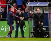 13 June 2025; Shelbourne manager Damien Duff and Shamrock Rovers manager Stephen Bradley shake hands after the SSE Airtricity Men's Premier Division match between Shelbourne and Shamrock Rovers at Tolka Park in Dublin. Photo by Stephen McCarthy/Sportsfile