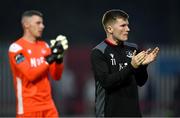 13 June 2025; Drogheda United players Conor Kane, right, and goalkeeper Luke Dennison acknowledge supporters after the SSE Airtricity Men's Premier Division match between St Patrick's Athletic and Drogheda United at Richmond Park in Dublin. Photo by Shauna Clinton/Sportsfile