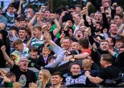 13 June 2025; (EDITORS NOTE: Image contains profanity) Shamrock Rovers supporters celebrate their second goal during the SSE Airtricity Men's Premier Division match between Shelbourne and Shamrock Rovers at Tolka Park in Dublin. Photo by Stephen McCarthy/Sportsfile