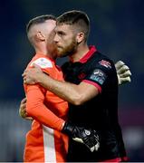 13 June 2025; Conor Keeley of Drogheda United, right, hugs team-mates Luke Dennison after the SSE Airtricity Men's Premier Division match between St Patrick's Athletic and Drogheda United at Richmond Park in Dublin. Photo by Shauna Clinton/Sportsfile