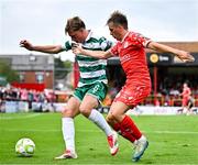 13 June 2025; James Norris of Shelbourne in action against Daniel Cleary of Shamrock Rovers during the SSE Airtricity Men's Premier Division match between Shelbourne and Shamrock Rovers at Tolka Park in Dublin. Photo by Sam Barnes/Sportsfile