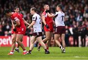 1 June 2025; Cillian McDaid of Galway and Ciarán McFaul of Derry tussle during the GAA Football All-Ireland Senior Championship Round 2 match between Derry and Galway at Celtic Park in Derry. Photo by Piaras Ó Mídheach/Sportsfile