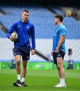 14 June 2025; Sam Prendergast of Leinster, left, speaks to team-mate Jimmy O'Brien before the United Rugby Championship Grand Final match between Leinster and Vodacom Bulls at Croke Park in Dublin. Photo by Brendan Moran/Sportsfile
