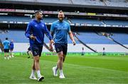 14 June 2025; Max Deegan of Leinster, left, and team-mate RG Snyman walk the pitch before the United Rugby Championship Grand Final match between Leinster and Vodacom Bulls at Croke Park in Dublin. Photo by Brendan Moran/Sportsfile