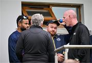 14 June 2025; Umpires Mark Hawthorne and Johnny Kennedy in conversation with West Indies captain Shai Hope, left, and Ireland captain Paul Stirling before abandoning match two of the T20 International Series between Ireland and the West Indies at Bready Cricket Club in Magheramason, Tyrone. Photo by Sam Barnes/Sportsfile