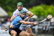 14 June 2025; Chris Crummey of Dublin in action against Jack Sheridan of Kildare during the GAA Hurling All-Ireland Senior Championship Round 1 match between Kildare and Dublin at Cedral St Conleth's Park in Newbridge, Kildare. Photo by Piaras Ó Mídheach/Sportsfile