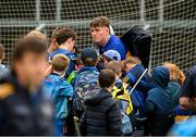 14 June 2025; Rhys Shelly of Tipperary signs autographs after the GAA Hurling All-Ireland Senior Championship Round 1 match between Laois and Tipperary at Laois Hire O'Moore in Portlaoise, Laois. Photo by Daire Brennan/Sportsfile