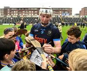 14 June 2025; Seamus Kennedy of Tipperary signs autographs after the GAA Hurling All-Ireland Senior Championship Round 1 match between Laois and Tipperary at Laois Hire O'Moore in Portlaoise, Laois. Photo by Daire Brennan/Sportsfile