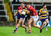 14 June 2025; Brian Stack of Roscommon in action against Colm O'Callaghan of Cork during the GAA Football All-Ireland Senior Championship Round 3 match between Roscommon and Cork at Laois Hire O'Moore Park in Portlaoise, Laois. Photo by Daire Brennan/Sportsfile