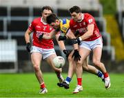 14 June 2025; Brian Stack of Roscommon in action against Daniel O'Mahony of Cork during the GAA Football All-Ireland Senior Championship Round 3 match between Roscommon and Cork at Laois Hire O'Moore Park in Portlaoise, Laois. Photo by Daire Brennan/Sportsfile