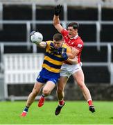 14 June 2025; Ronan Daly of Roscommon in action against Colm O'Callaghan of Cork during the GAA Football All-Ireland Senior Championship Round 3 match between Roscommon and Cork at Laois Hire O'Moore Park in Portlaoise, Laois. Photo by Daire Brennan/Sportsfile