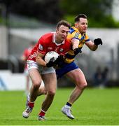 14 June 2025; Sean Meehan of Cork in action against Ciaráin Murtagh of Roscommon during the GAA Football All-Ireland Senior Championship Round 3 match between Roscommon and Cork at Laois Hire O'Moore Park in Portlaoise, Laois. Photo by Daire Brennan/Sportsfile