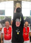 14 June 2025; St Patrick's Athletic goalkeeper Joe Curley lifts the cup after winning the League of Ireland Walking Football Festival at the National Indoor Arena on the Sport Ireland Campus in Dublin. Photo by Stephen McCarthy/Sportsfile