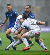 14 June 2025; James Lowe of Leinster is tackled by Vodacom Bulls players Johan Goosen, left, and Marco van Staden during the United Rugby Championship Grand Final match between Leinster and Vodacom Bulls at Croke Park in Dublin. Photo by David Fitzgerald/Sportsfile