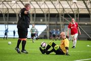 14 June 2025; Andrew Feakins of Sligo Rovers in action against Eamon Duggan of Cork City during the League of Ireland Walking Football Festival at the National Indoor Arena on the Sport Ireland Campus in Dublin. Photo by Stephen McCarthy/Sportsfile