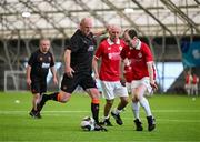 14 June 2025; Anthony Gossage of Cork City in action against Greg Clark of Sligo Rovers during the League of Ireland Walking Football Festival at the National Indoor Arena on the Sport Ireland Campus in Dublin. Photo by Stephen McCarthy/Sportsfile