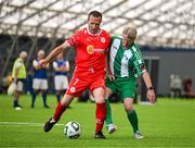 14 June 2025; Anto Hyde of Shelbourne in action against Paul Massey of Bray Wanderers during the League of Ireland Walking Football Festival at the National Indoor Arena on the Sport Ireland Campus in Dublin. Photo by Stephen McCarthy/Sportsfile