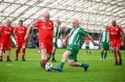 14 June 2025; Dave Bell of Shelbourne in action against Aidan O'Neill of Bray Wanderers during the League of Ireland Walking Football Festival at the National Indoor Arena on the Sport Ireland Campus in Dublin. Photo by Stephen McCarthy/Sportsfile